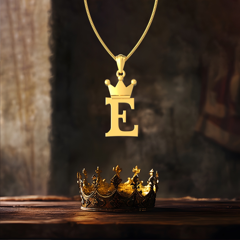 Gold E initial pendant with royal crown design