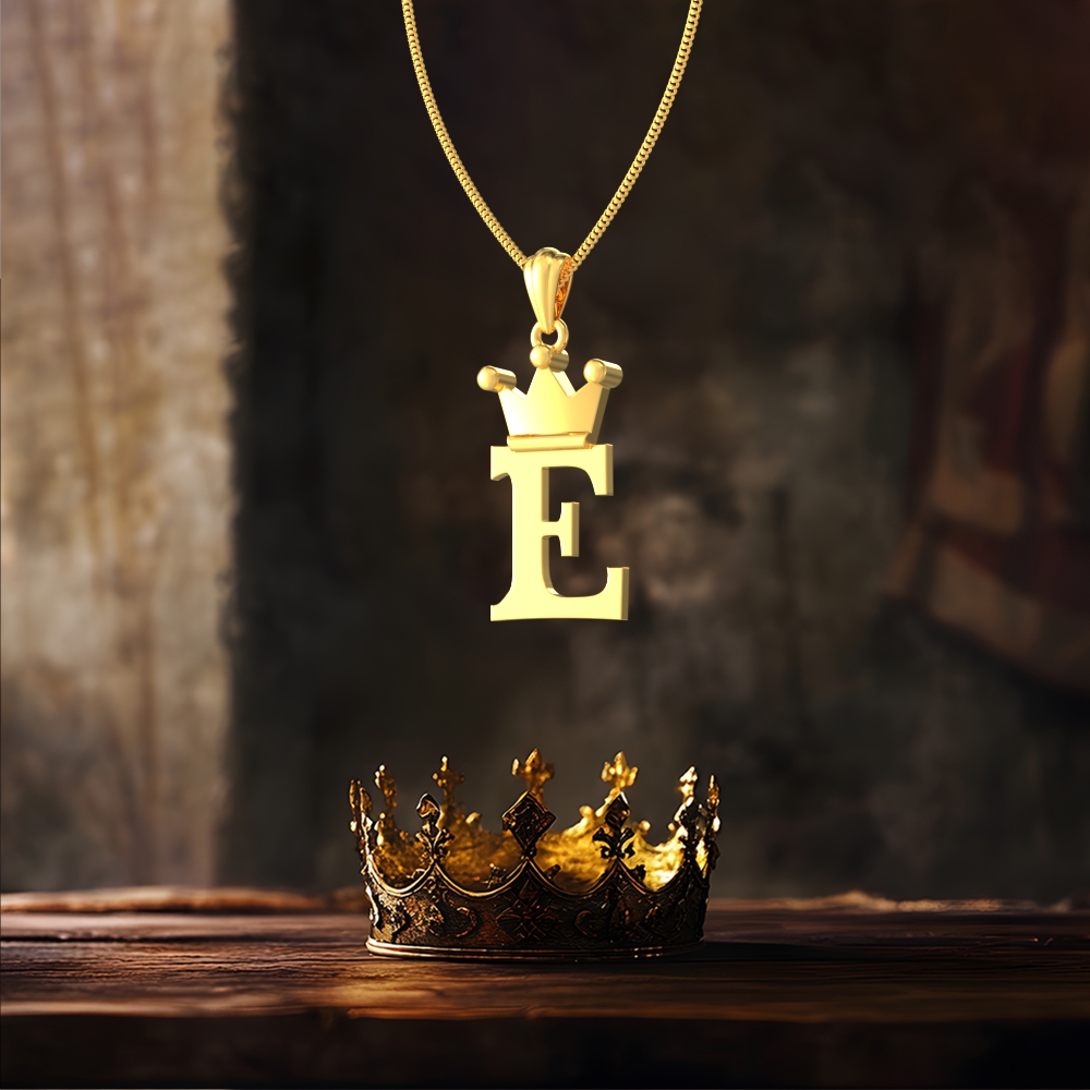 Gold E initial pendant with royal crown design