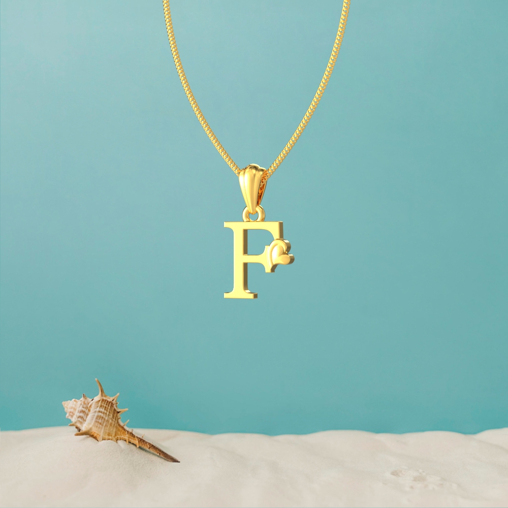 Gold F initial pendant with a lovely heart design