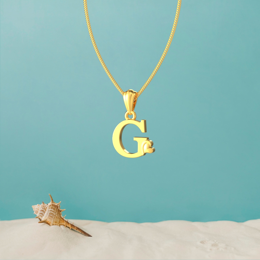 Gold G initial pendant with a lovely heart design