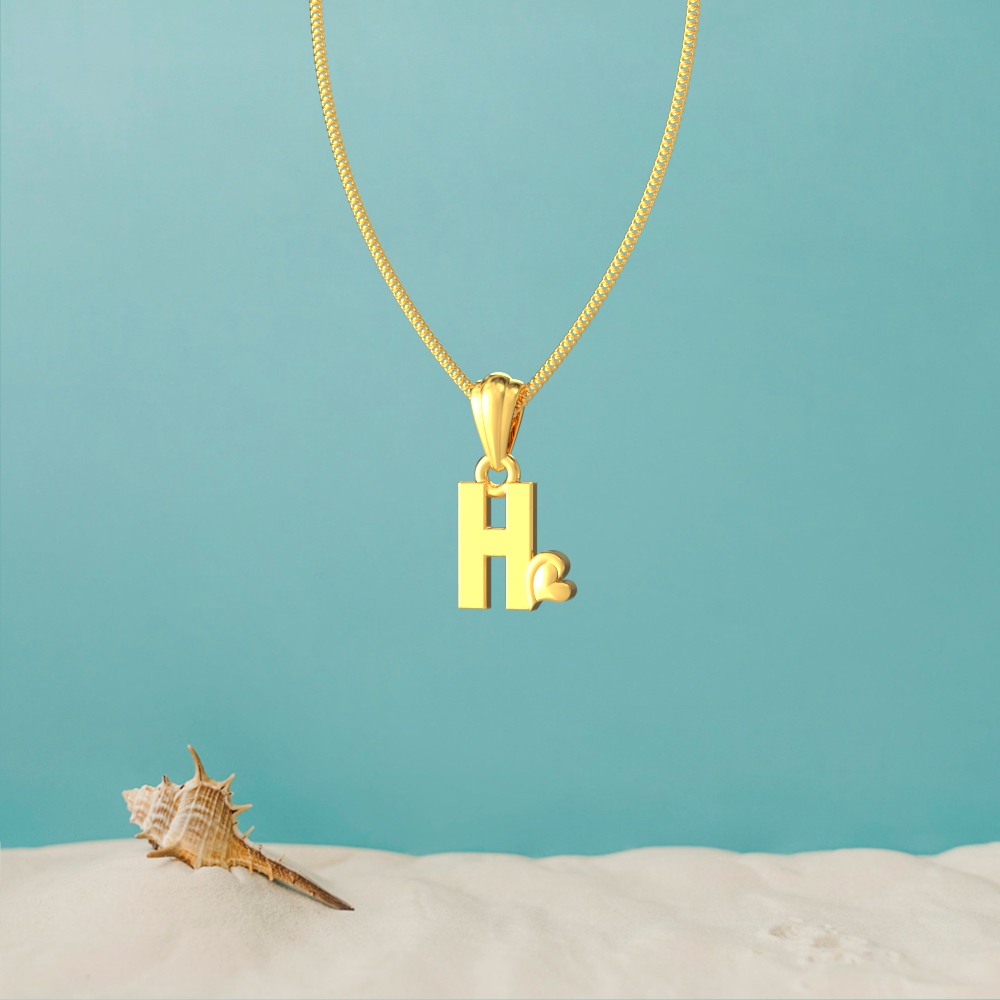 Gold H initial pendant with a lovely heart design