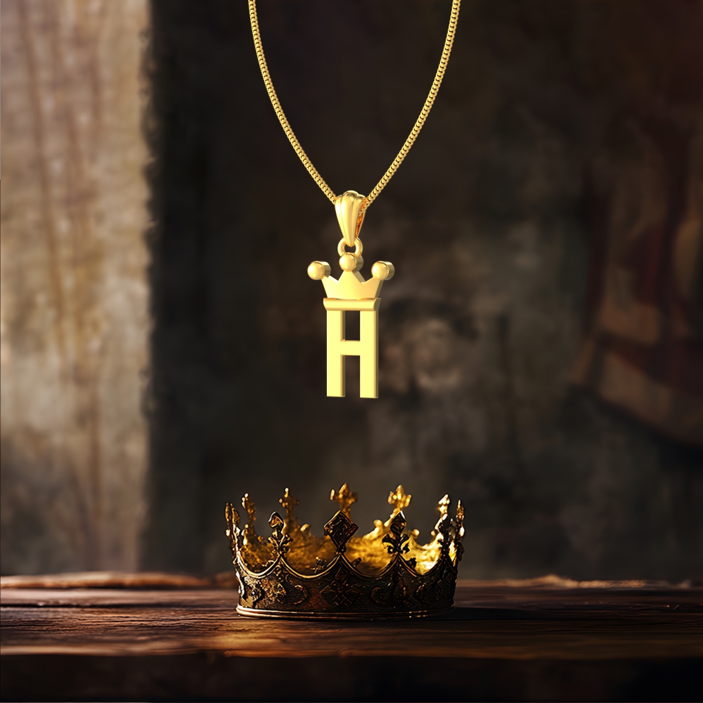 Gold H initial pendant with royal crown design