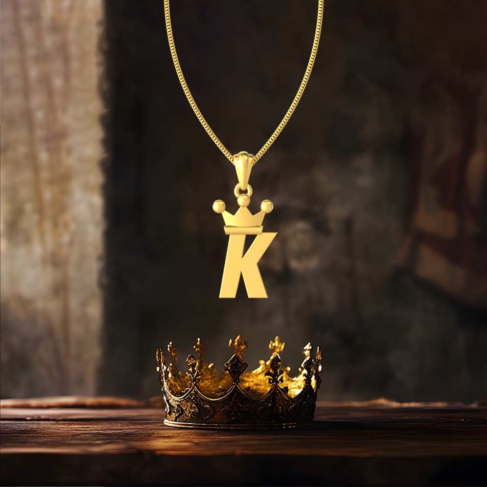 Gold K initial pendant with royal crown design