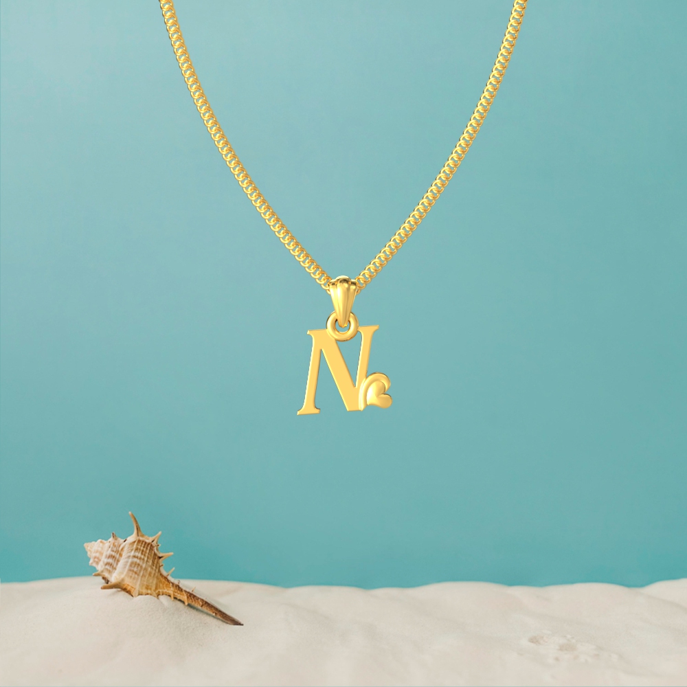 Gold N initial pendant with a lovely heart design