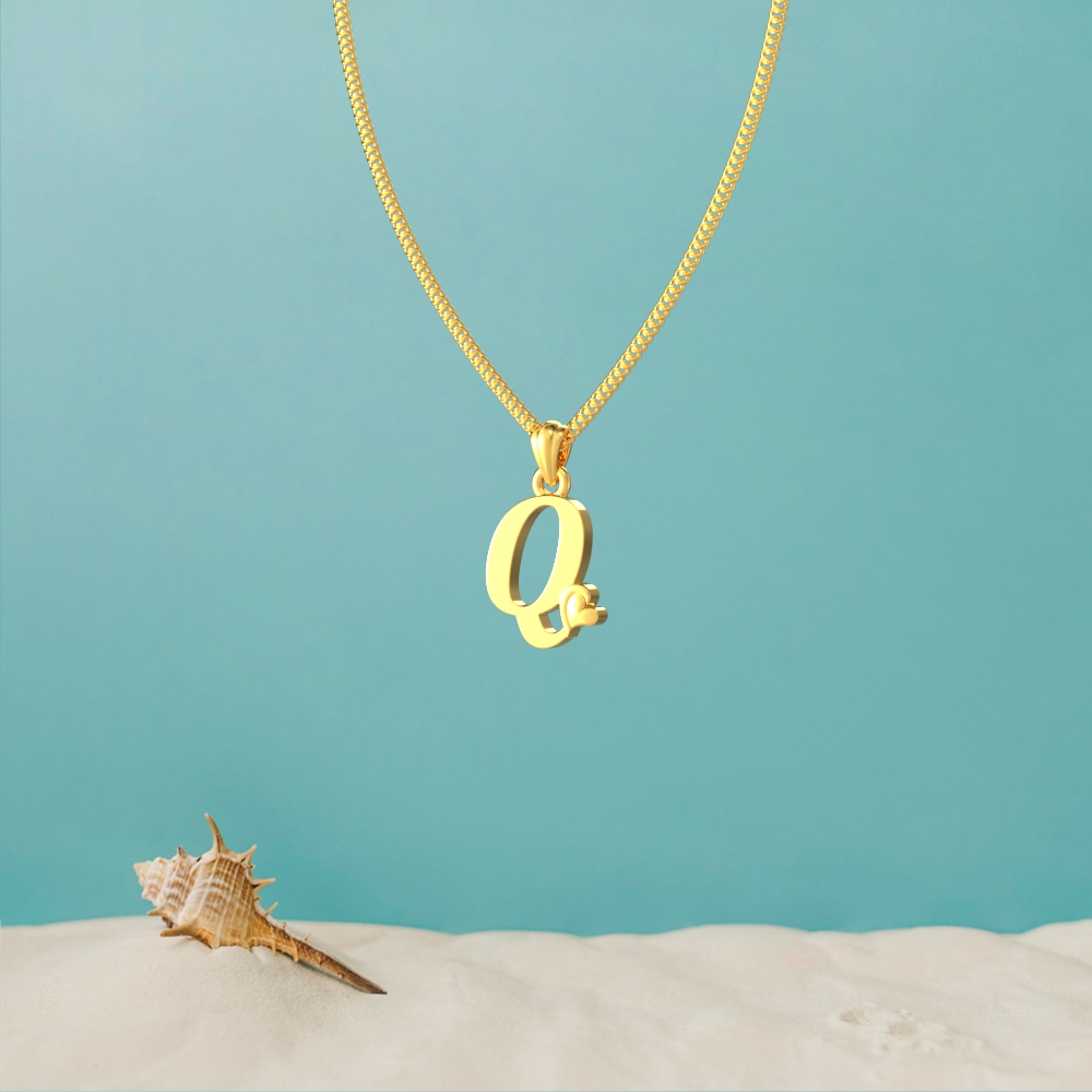 Gold Q initial pendant with a lovely heart design