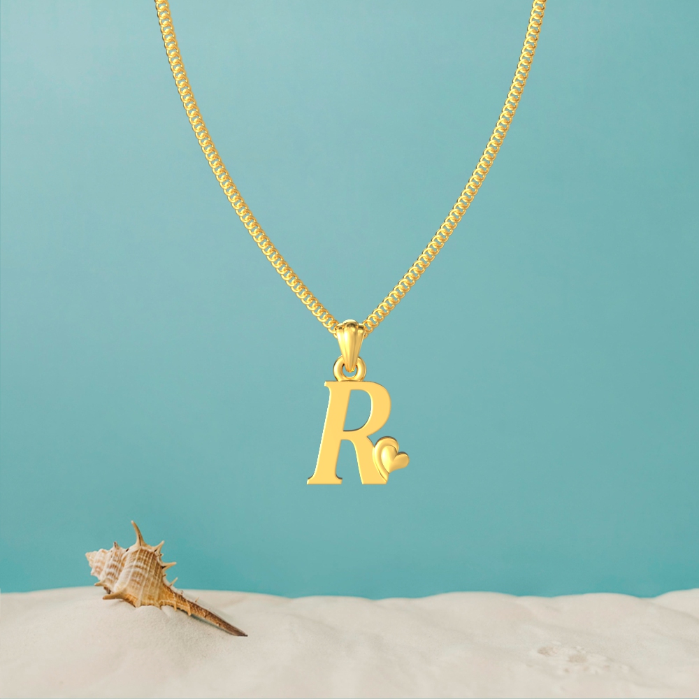 Gold R initial pendant with a lovely heart design