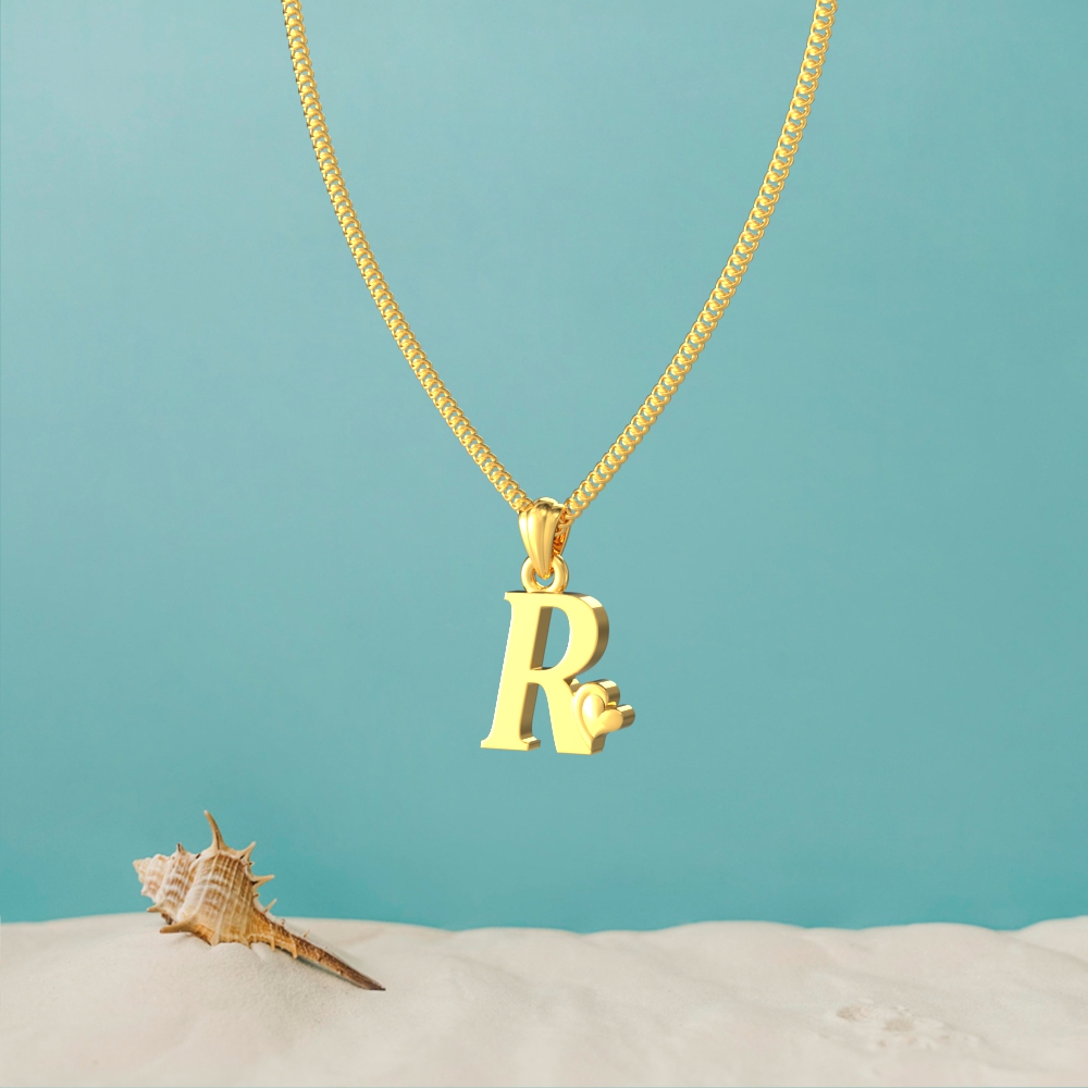 Gold R initial pendant with a lovely heart design